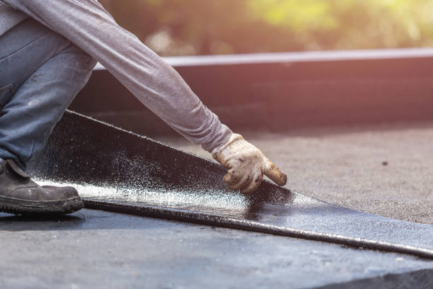 Professional Exterior Waterproofing technician working in Palo, MI